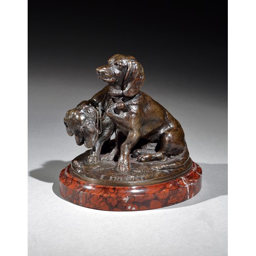 A fair of bronze dachshunds